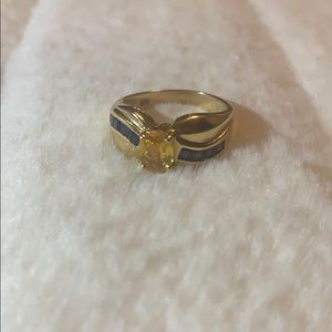 Sparkling blue and gold ring